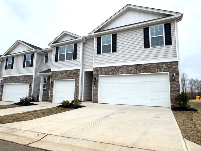 Building Photo - Brand New 4BR 2.5BA Townhome