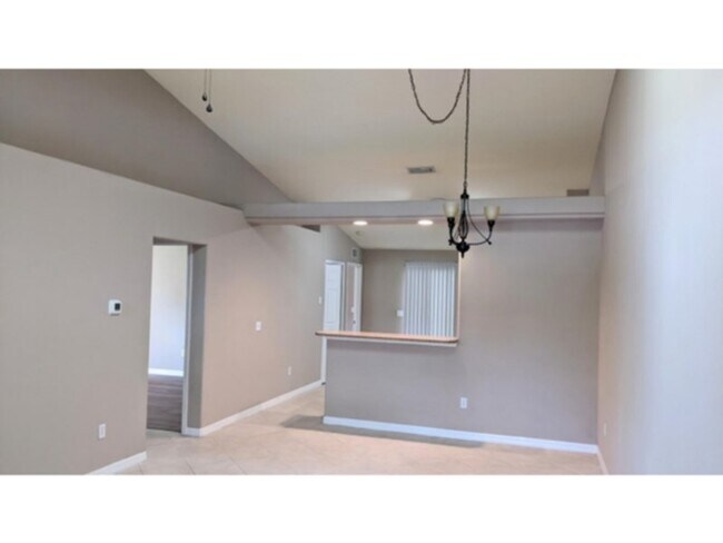 Building Photo - 3/2/1 duplex in Palm Coast, FL       www.W...
