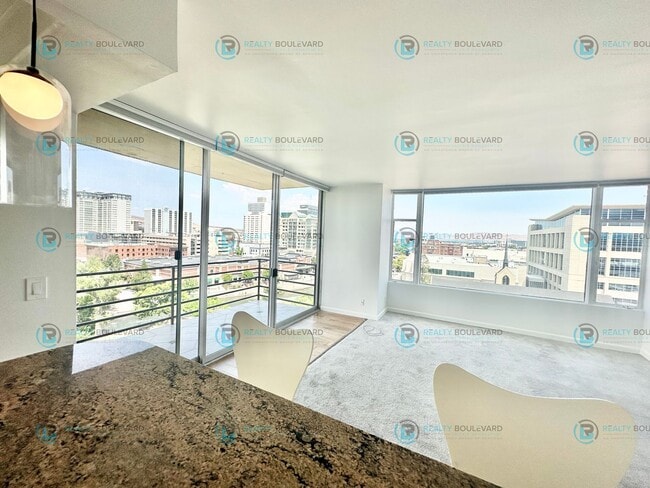 Building Photo - Exquisite 1-bedroom, 2-bathroom condo Overlooking the beautiful Truckee River with covered parking!