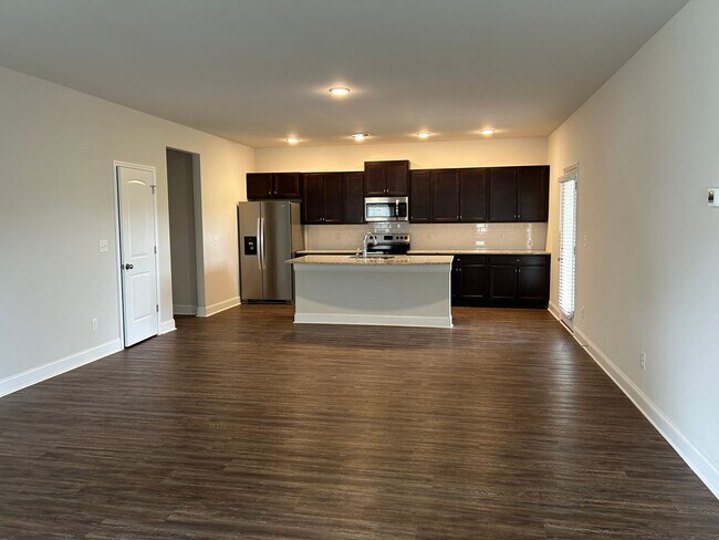 Building Photo - Three car garage Two story home close to e...
