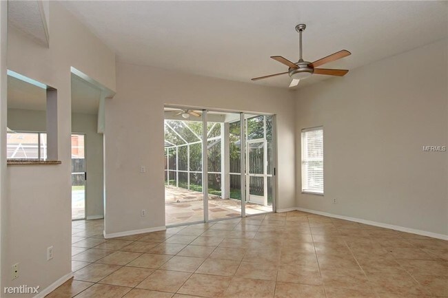 Building Photo - 4 br, 2.5 bath House - 5411 Pine Bay Dr
