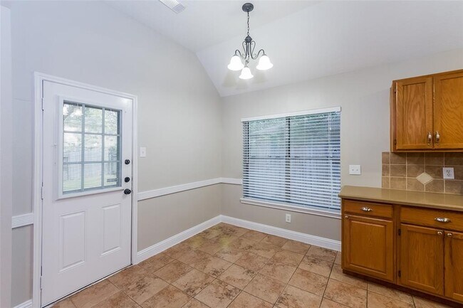 Building Photo - 5915 Woodmancote Dr