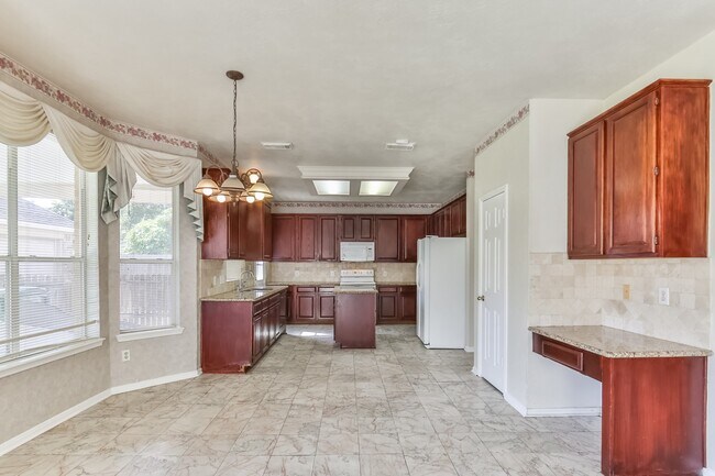 Foto del edificio - 8811 Earnestwood Dr