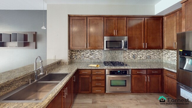 Building Photo - 2 + 2 Modern Condo in Prime Warner Center ...