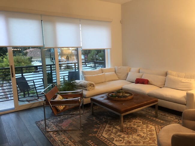 Living Room with Balcony - 293 Dockside Ln
