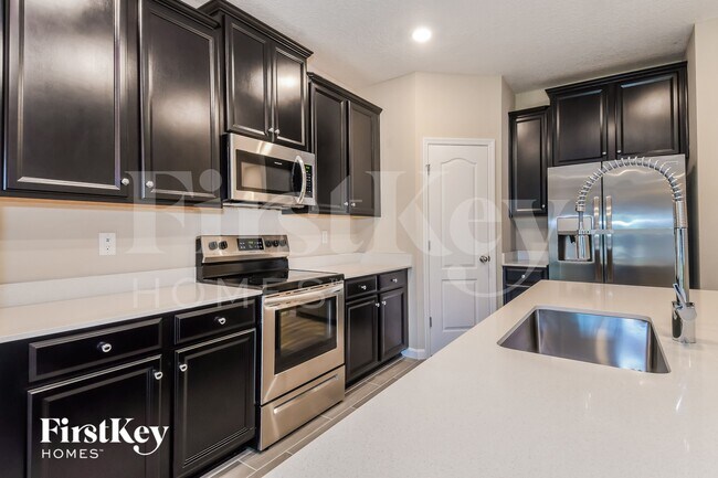 Foto del edificio - 385 Stone Arbor Ln
