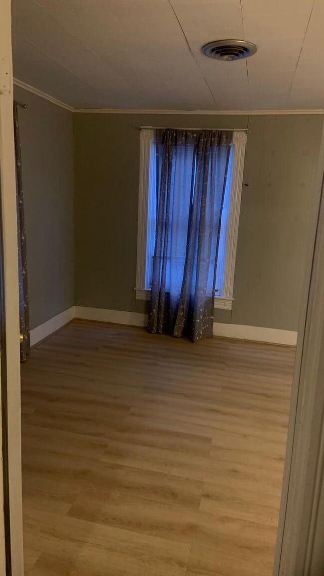 Largest bedroom with wooden floors, unfinished. - 21 Gage Ave