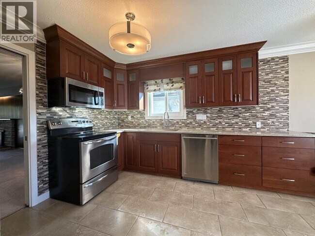Photo du bâtiment - 1542 W 65th Ave