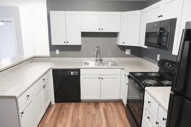 Cocina de planta abierta - Willow Green Apartments