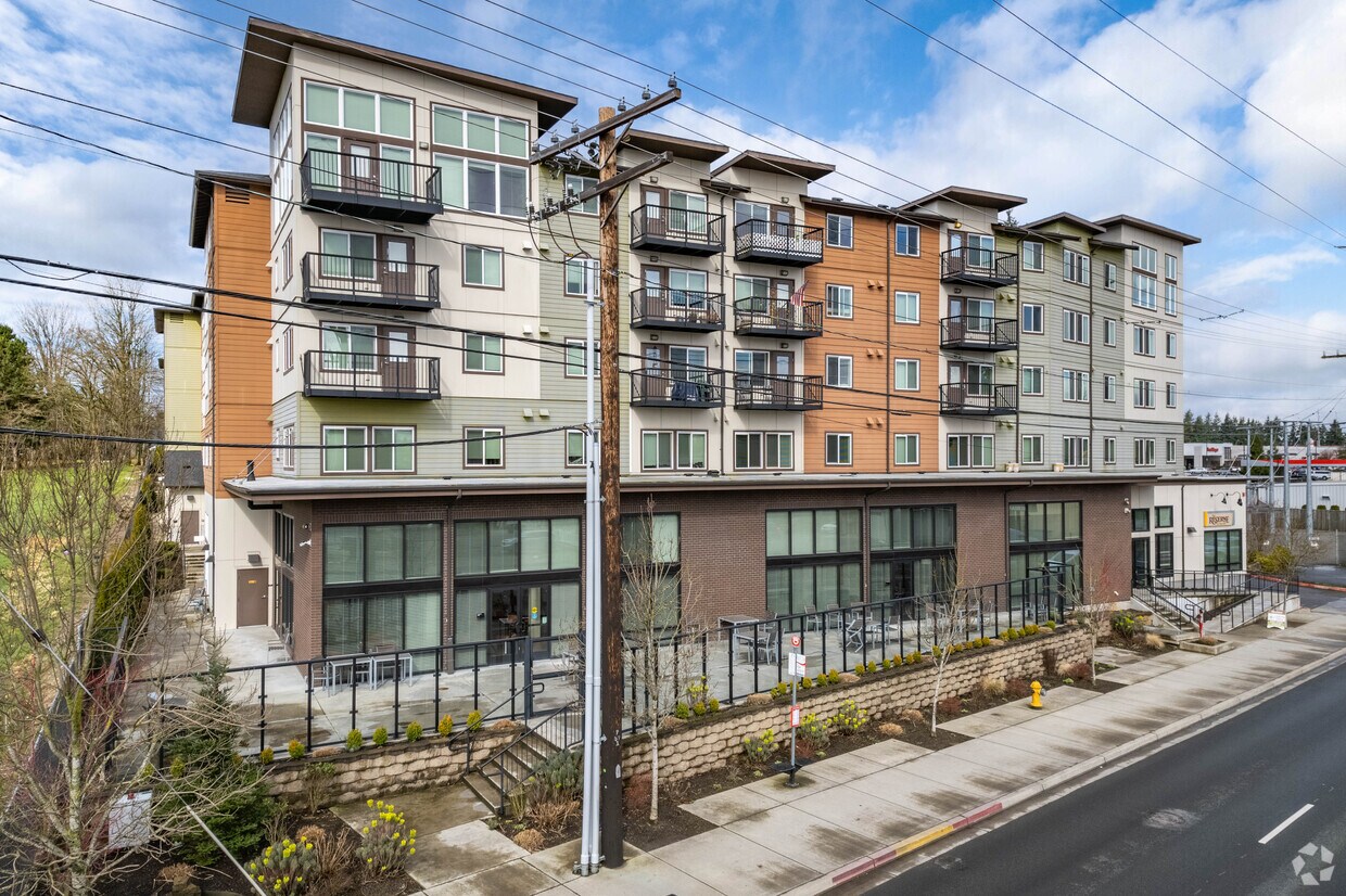 Edificio seguro y protegido con acceso controlado. - Reserve at Everett for 55+ Active Seniors