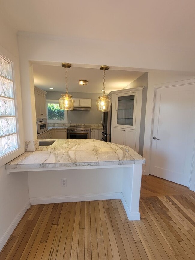 Building Photo - Charming 2-Bed, 2-Bath with Modern Touches...