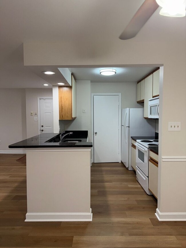Building Photo - Silver Spring Condo with Modern Comforts a...
