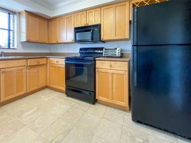 Foto del edificio - 10000 Bay Harbor Terrace