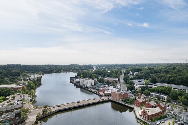 The Saugatuck River meanders through the heart of Westport, lush and serene.