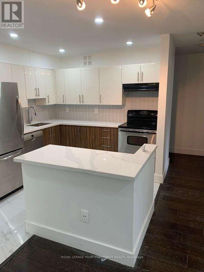 Photo du bâtiment - 1450 Glen Abbey Gate