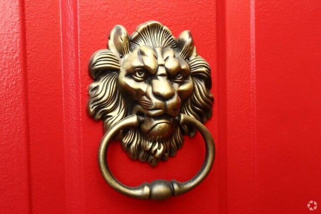 All doors have their own lion knocker! - The Red Lion