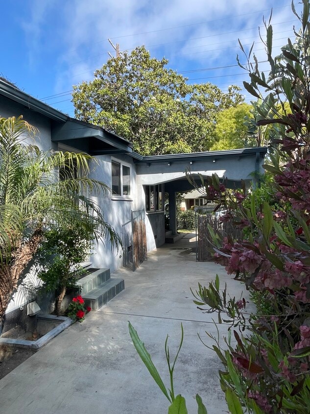 Carport, Driveway, Side door to yard - 11419 Charnock Rd