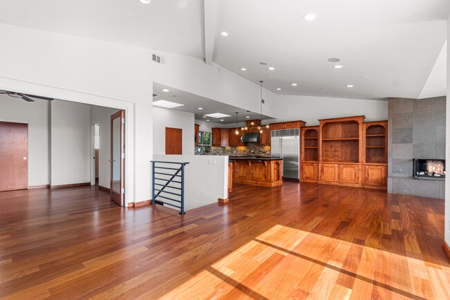 Dining area with view of kitchen and upstairs bedroom/office - 1542 Manhattan Beach Blvd