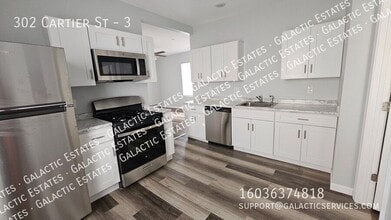 Building Photo - 302 Cartier St