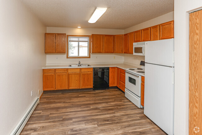 3BR, 3BA - 1,380 - 1,610SF - Kitchen - Wheatland Townhomes