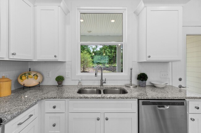 Building Photo - Brand new, Low-maintenance living!