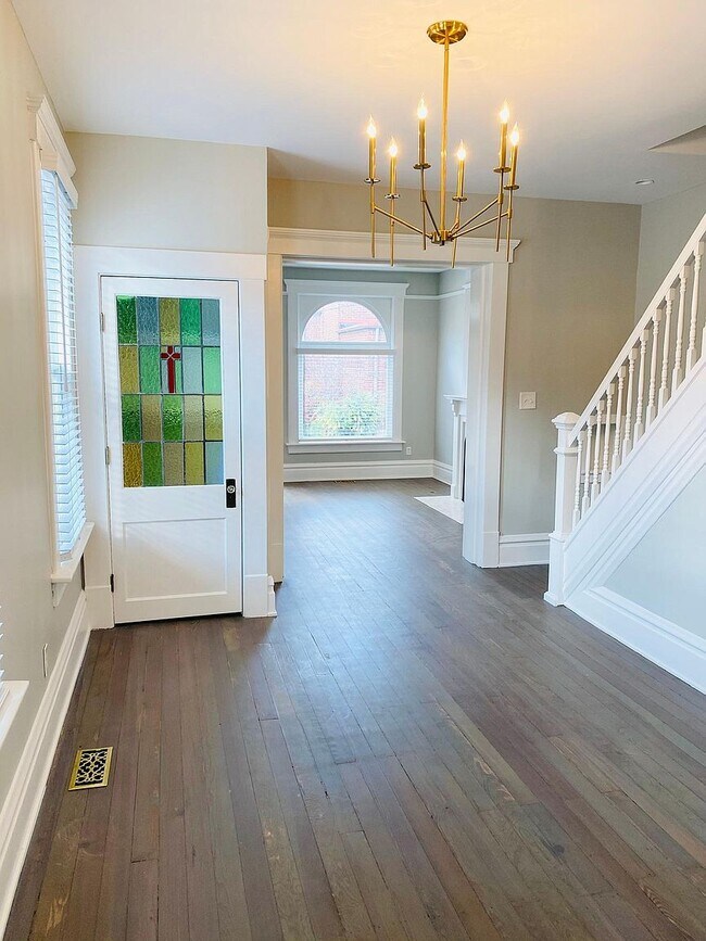 Dining Room and Coat Closet with original stained glass - 115 E Willow St