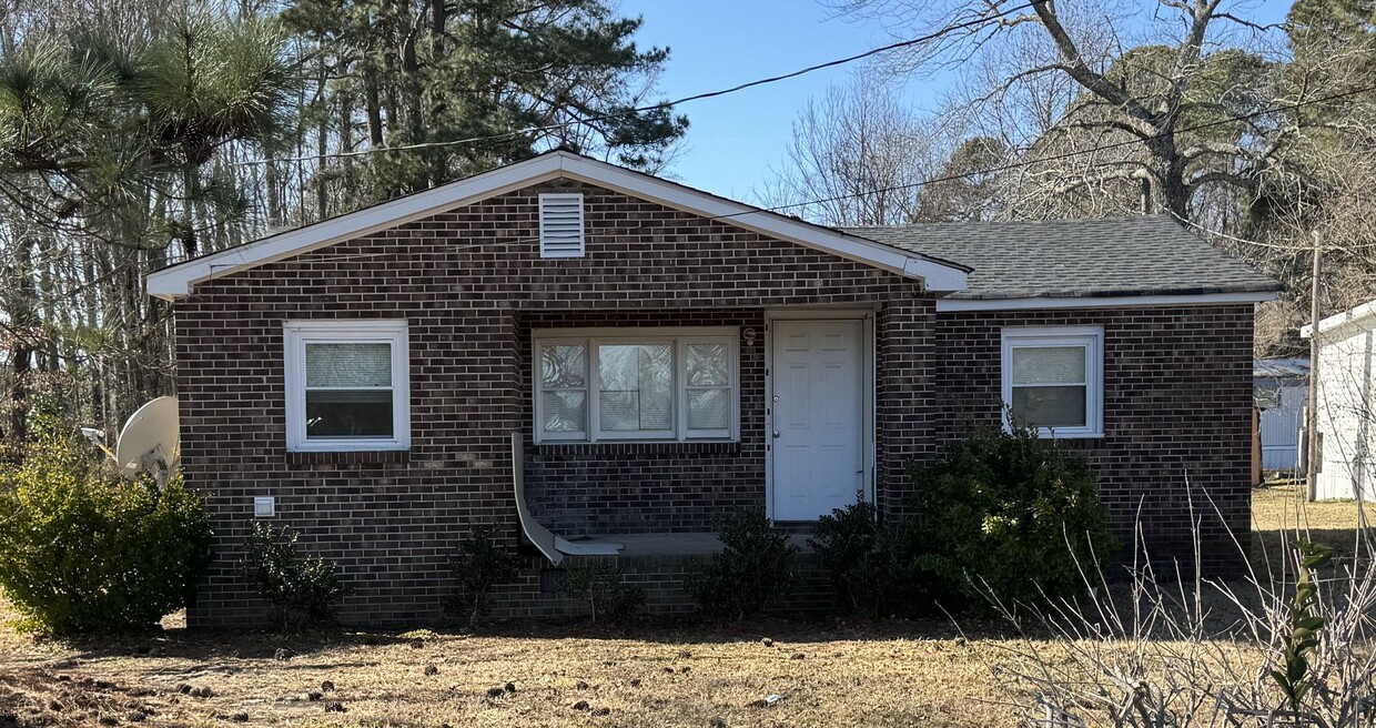 Primary Photo - Small Brick Bungalow