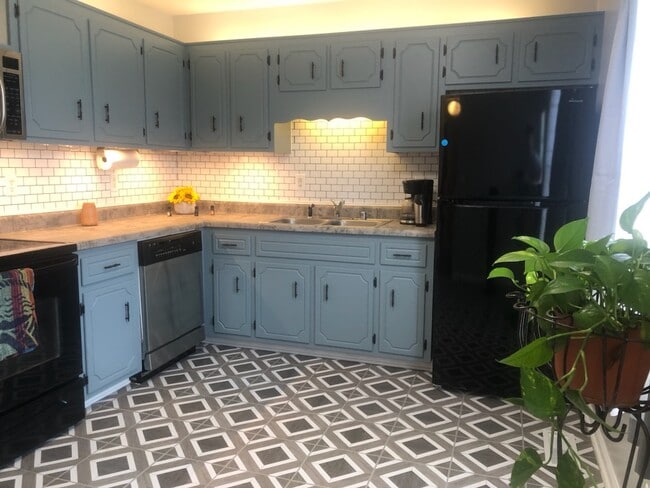 Kitchen with motion detected above and below cabinet lighting - 210 Golden Pond Ave