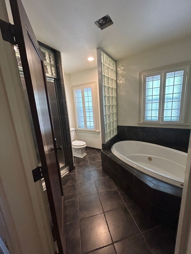 Building Photo - One-of-a-Kind Bungalow Oasis on Poly Drive...