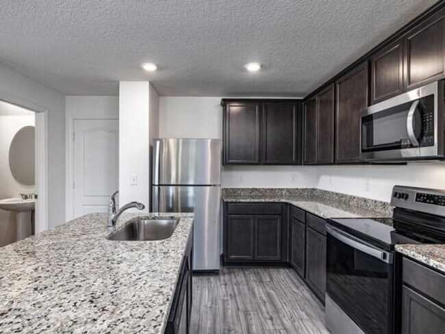 Building Photo - 3/2.5 Townhome built in 2022 - 2 car garag...
