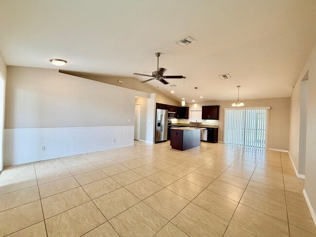 Building Photo - Move-In Ready 3BR Home in SW Cape Coral with Fenced Yar+Screened Lanai+Lawn Care Included+Pet Fri...