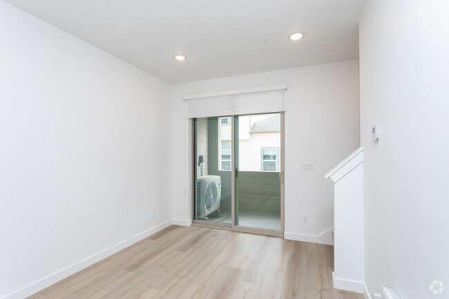 1BR, 1.5BA - 775SF - Living Room - Innovation Park at Holbrook Farms