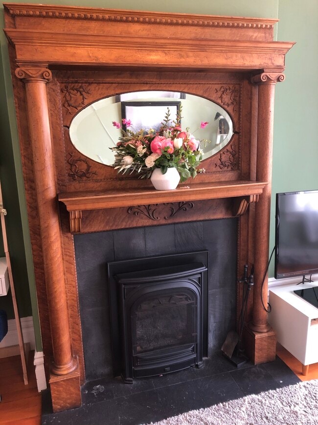 close up on the mantle and gas fireplace insert heater - 1249 Masonic Ave