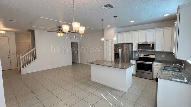 Photo - 6910 Tussilago Way Townhome