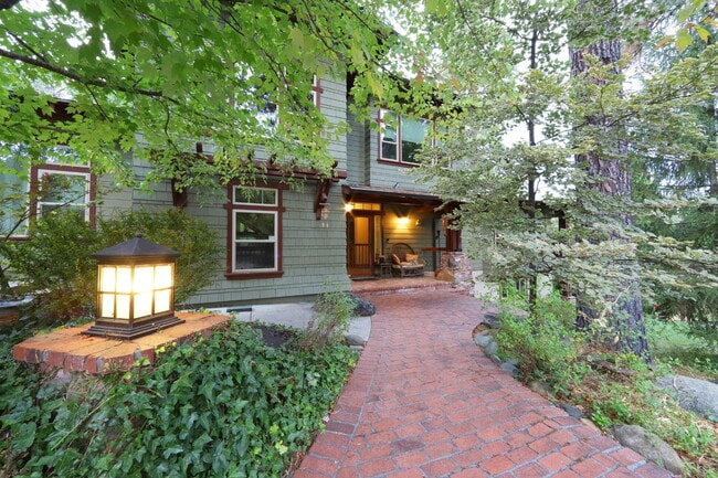 Building Photo - Don't miss this amazing opportunity to rent a higher end home nestled in the trees in the coveted...