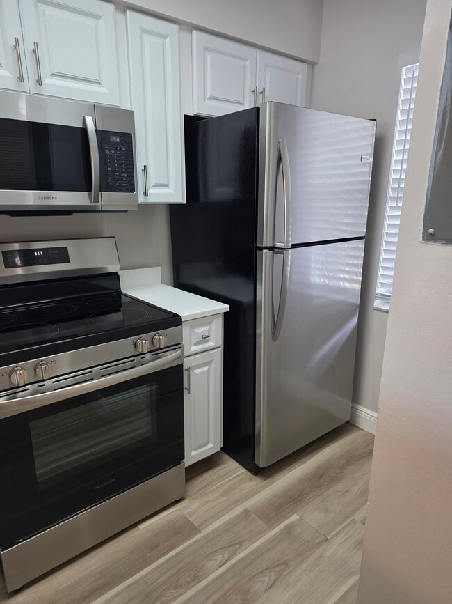 Refrigerator - 2222 N Cypress Bend Dr