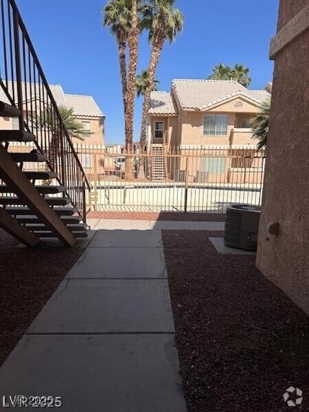 Building Photo - 1830 N Pecos Rd