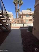 Building Photo - 1830 N Pecos Rd