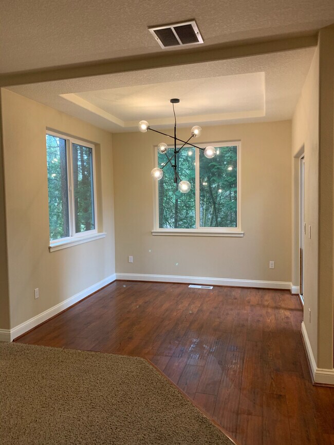 Dining nook with forested views - 5730 NE Lisbon Way