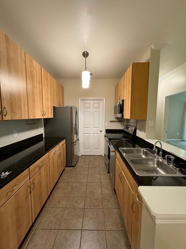 Building Photo - Fairview - Top Notch Condo Ready for Occup...