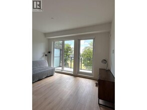 Building Photo - 133-W49 W 49th Ave