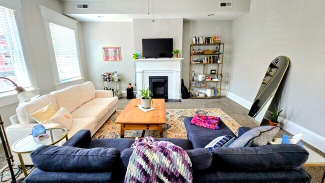 Large living room with natural light - 806 Main St