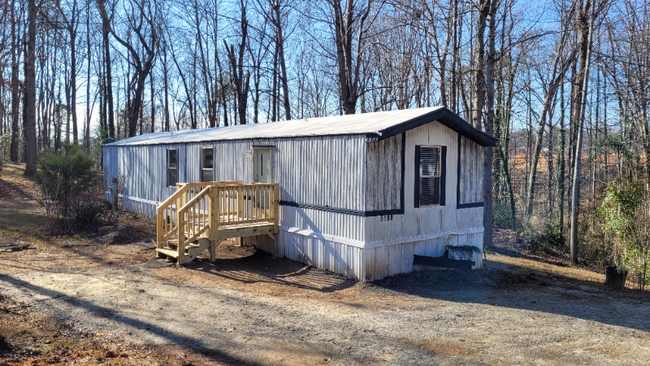 Building Photo - 6100 Briarwood Dr