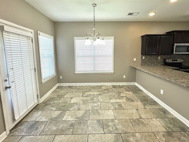Building Photo - Luxury, Style, Gated Community, 4 Bedroom ...