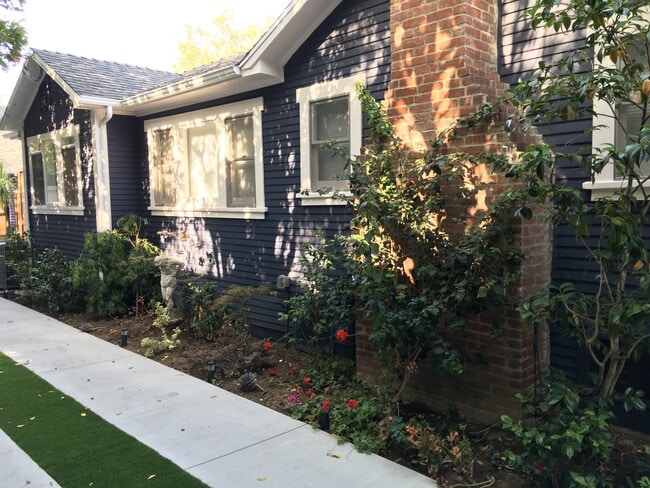 Side of House - 7024 De Longpre Ave