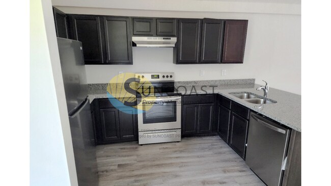 Building Photo - Gorgeous BRAND NEW 4BR/2BA Duplex Unit!