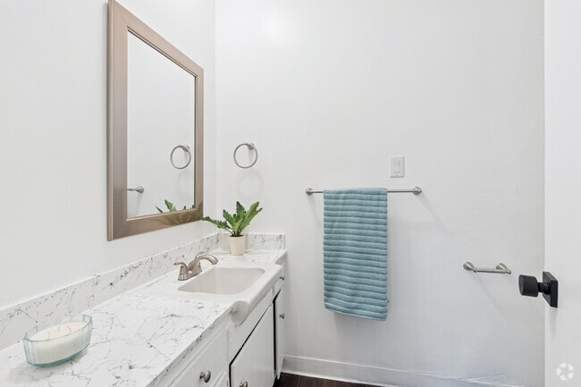 2BR, 2BA - 945SF - Primary Bathroom - Prospect Plaza Apartments