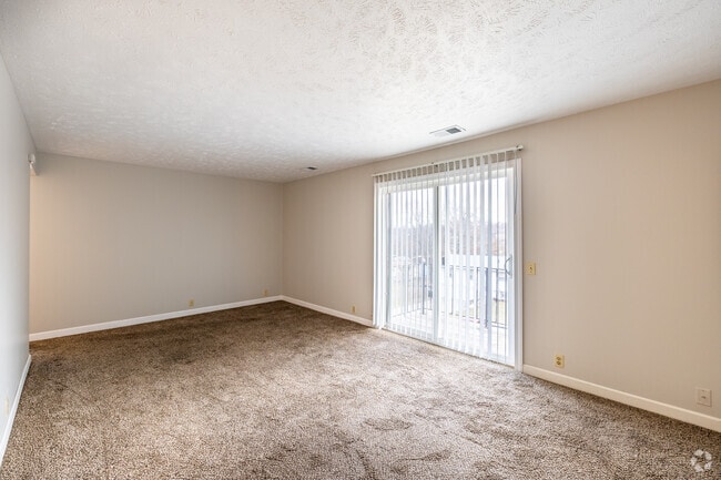 2BD, 1BA - 1,075SF - Living Room - Oakstone Apartments