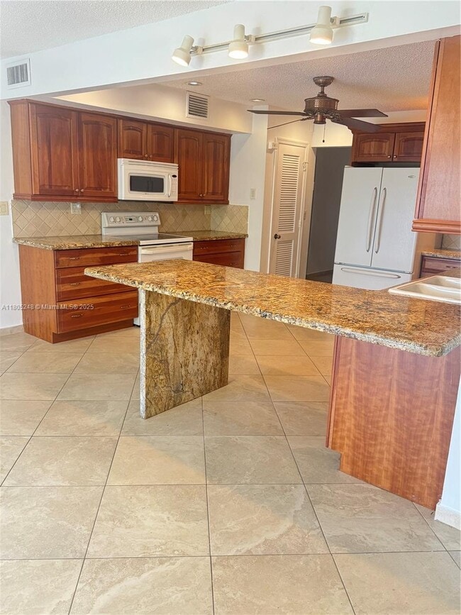 Building Photo - 3111 Coral Springs Dr