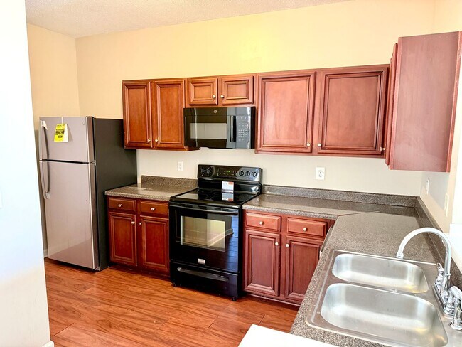 Building Photo - Welcome to this charming 2-bedroom, 2-bathroom corner townhome located in the vibrant community o...